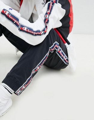 champion retro tracksuit bottoms with logo taping