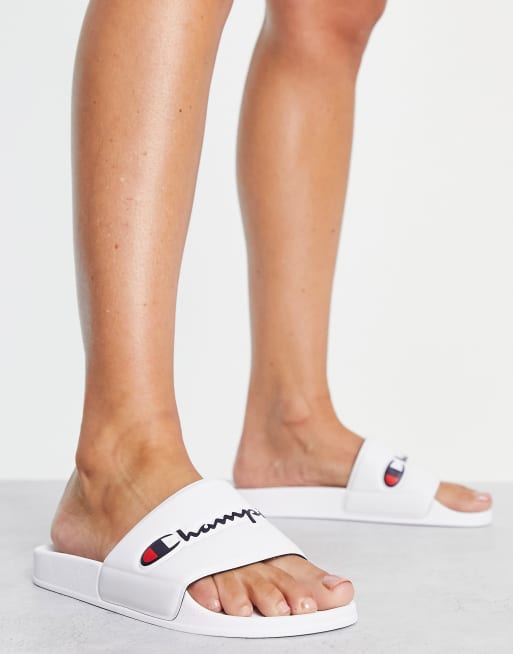 Champion slides with script logo in white ASOS