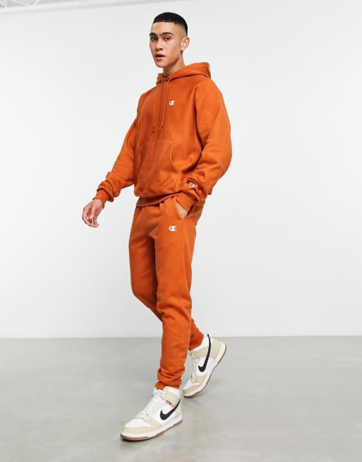 Champion small logo hoodie in tan ASOS