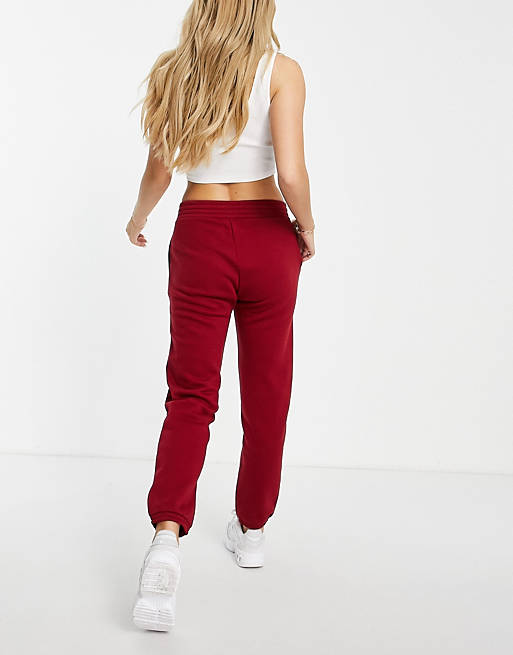 Women Champion small logo joggers in red 