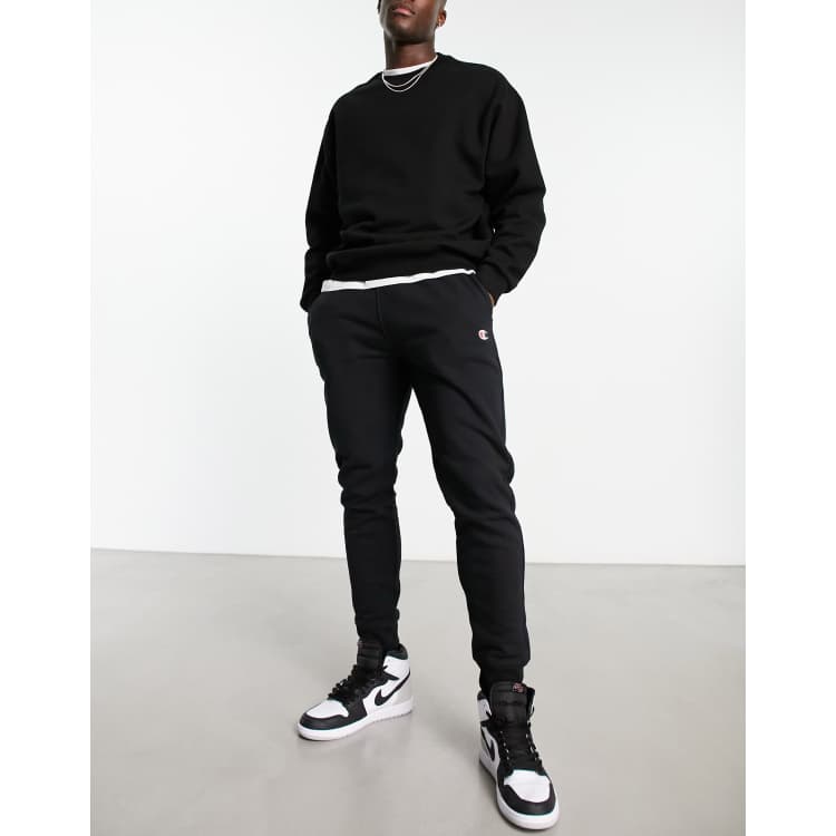 Champion small logo sweatpants black | ASOS