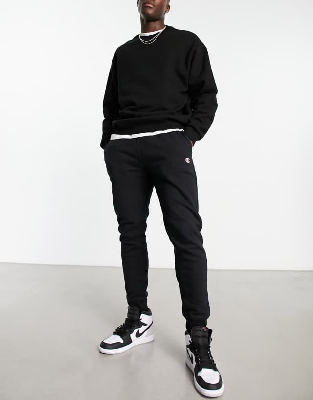 Champion small logo sweatpants in black