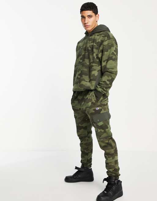 Champion small logo sweatpants in camo