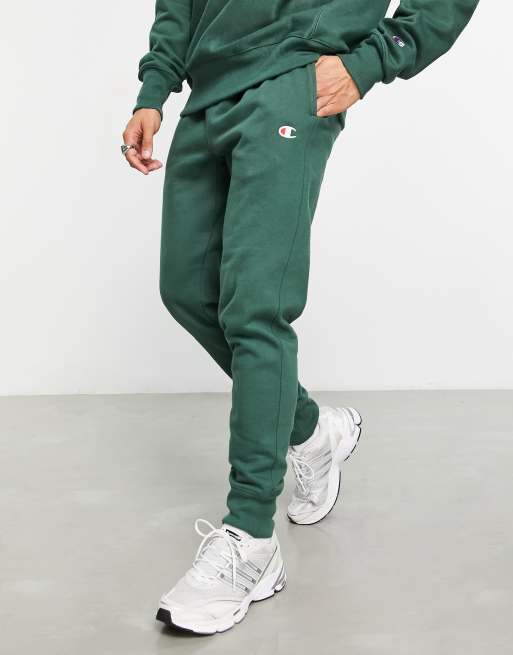 Champion small logo sweatpants in green ASOS