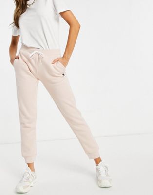 Champion small logo trackies in pink - ASOS Price Checker