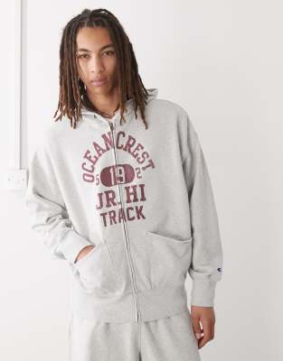 Champion - Sweat à capuche zippé à imprimé graphique - Gris