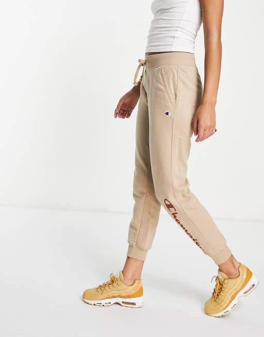 Champion sweatpants with large logo in tan