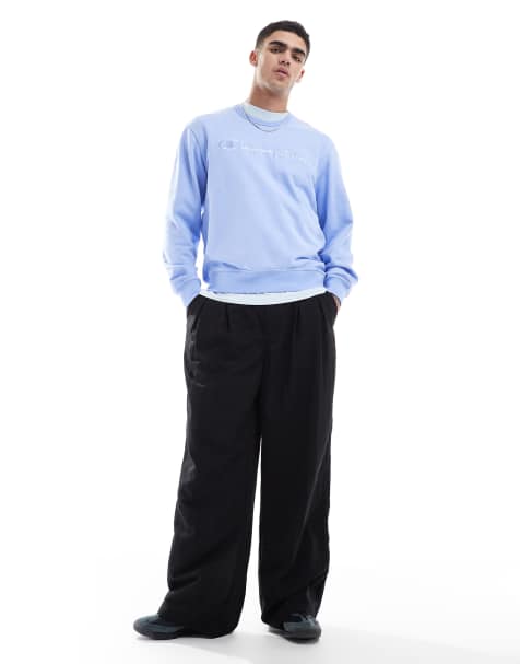 Champion – Sweatshirt in Blau mit farblich abgestimmtem Logo und Rundhalsausschnitt - view 1