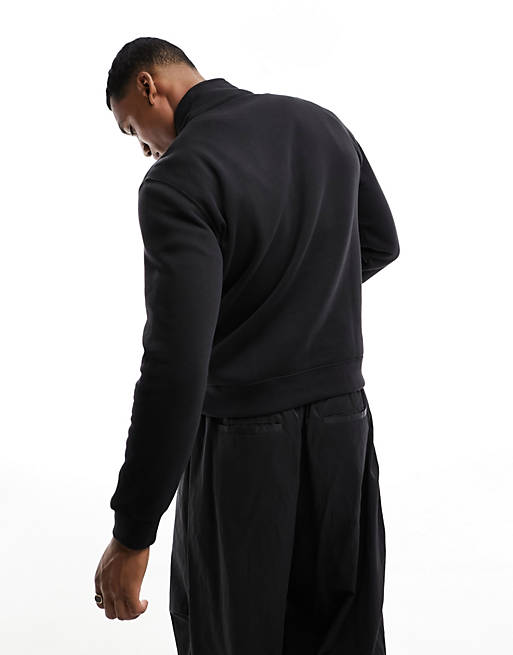 Champion – Sweatshirt in Schwarz mit kurzem Reißverschluss | ASOS