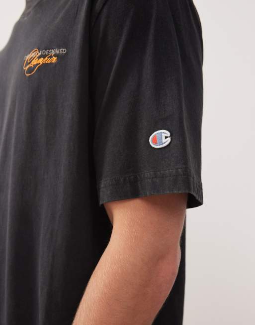 Champion T-shirt nera girocollo con grafica stampata sul retro