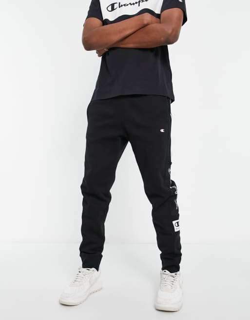 Champion taping logo trackies in black