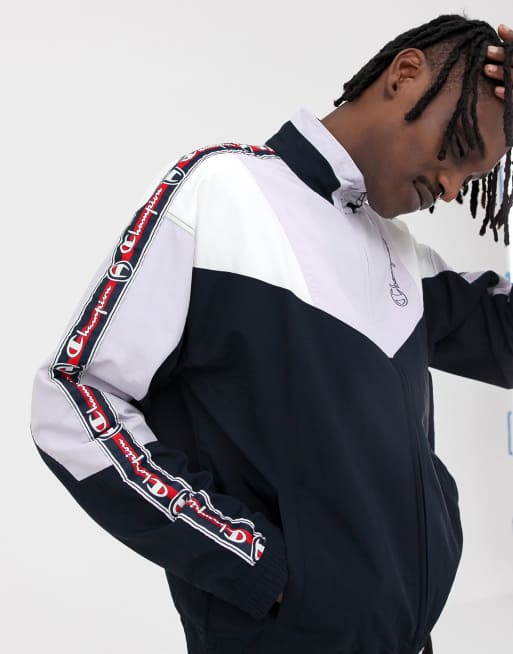 Champion track jacket with sleeve taping in navy ASOS