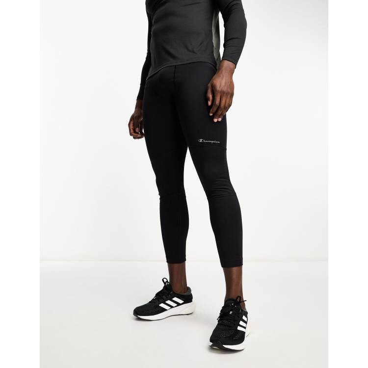 Under Armour Running Speedpocket tights in black and yellow