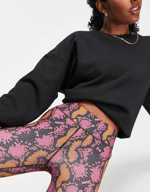Champion training snake print leggings in pink ASOS