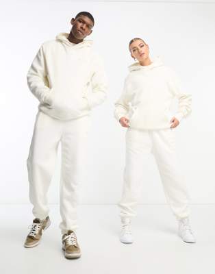 Champion unisex small logo joggers in cream - ASOS Price Checker