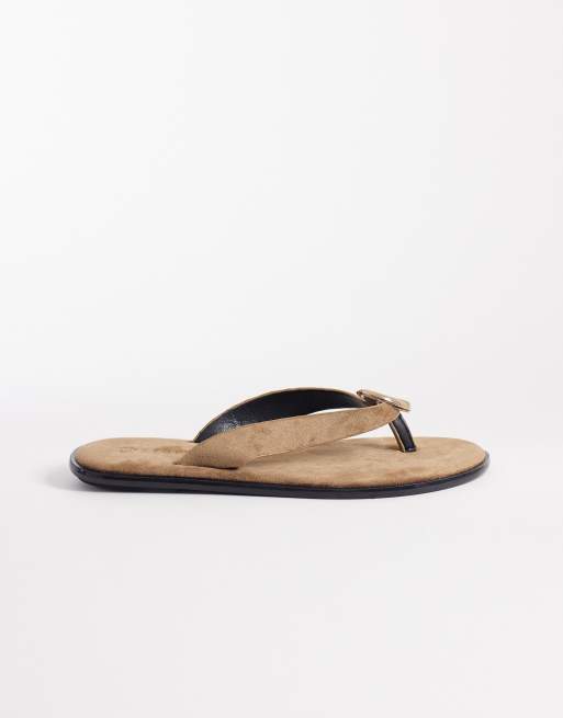 Chanclas color topo de antelina con adorno dorado de SEQWL