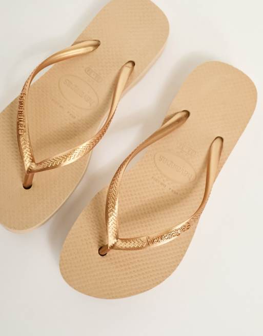 Havaianas doradas discount