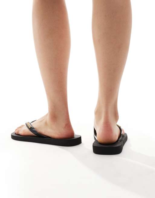 Chanclas negras clásicas con logo metálico de Havaianas, 3 de 4