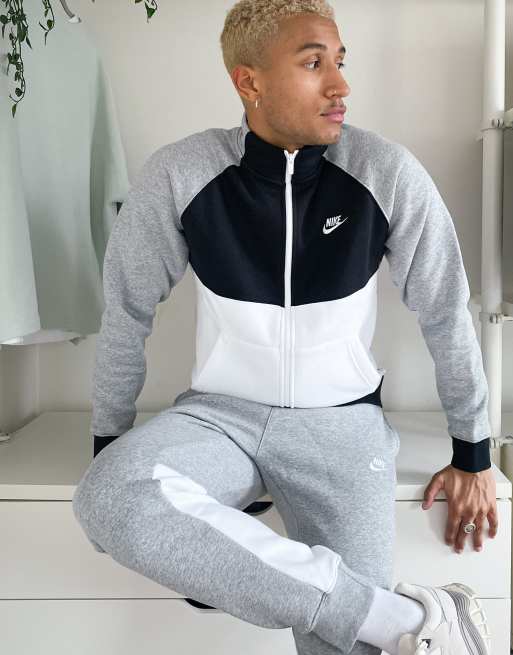 Chándal gris y negro con diseño color block de felpa de Nike |