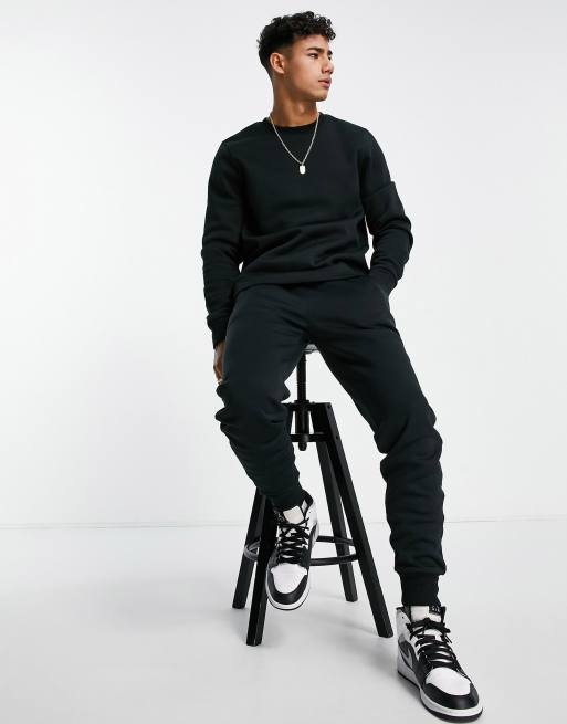 Chándal negro de joggers y sudadera con cuello redondo de Threadbare