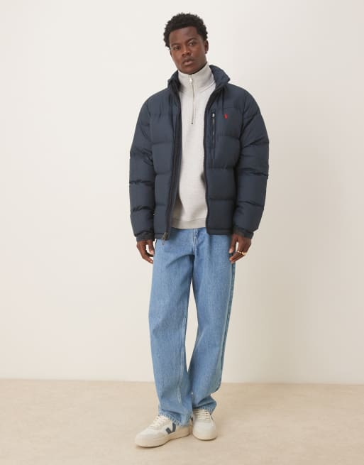 Chaqueta acolchada azul marino aislante con logo de icono de