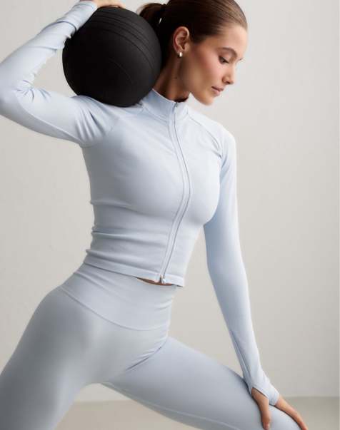 Chaqueta azul aura moldeadora sin costuras con cremallera Shape Seamless de Aim'n - view 1