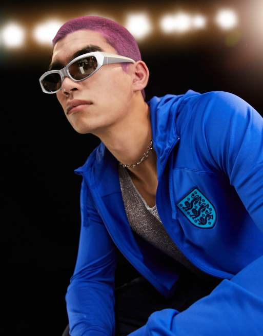 Chaqueta azul unisex con capucha y diseño de la selección de Inglaterra para la Copa Mundial 2022 de Nike Football