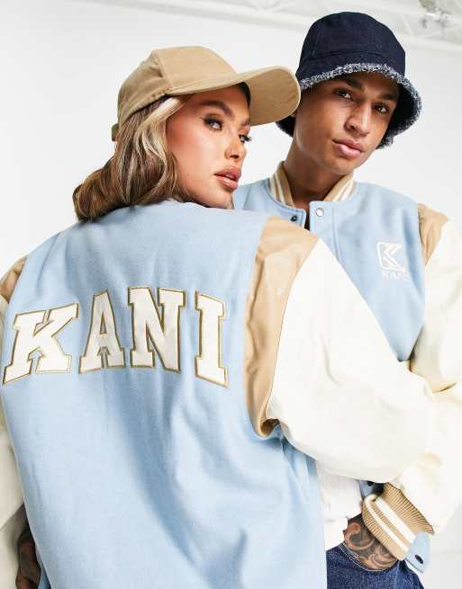 Chaqueta azul unisex con diseño color block de estilo universitario de Karl Kani