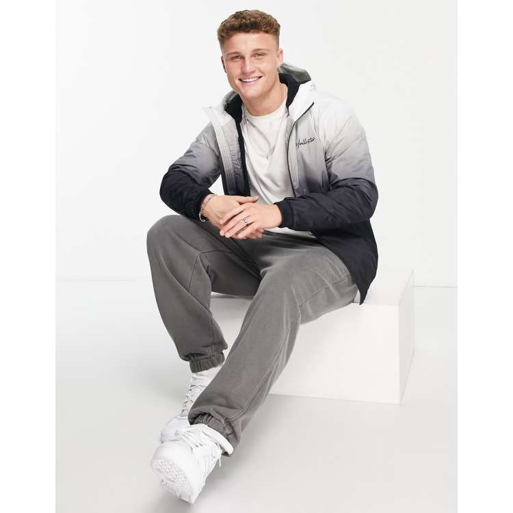 Chaqueta blanca y negra con capucha estampado degradado logo y