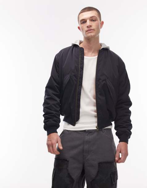 Chaqueta bomber azul marino oscuro con gráfico de camuflaje en contraste en las mangas y capucha de punto liso de Weekday - view 1