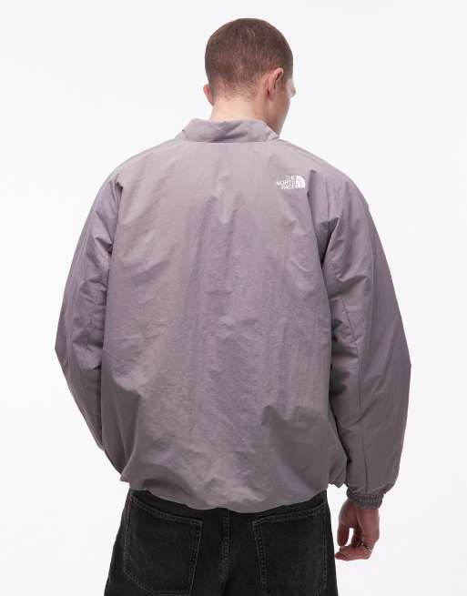 Chaqueta bomber gris ligera aislante NSE de The North Face, 3 de 5