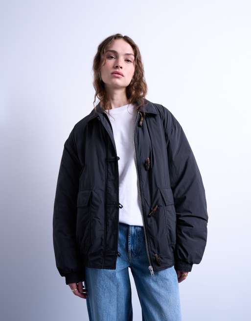 Chaqueta bomber negra acolchada con diseño híbrido de Topshop