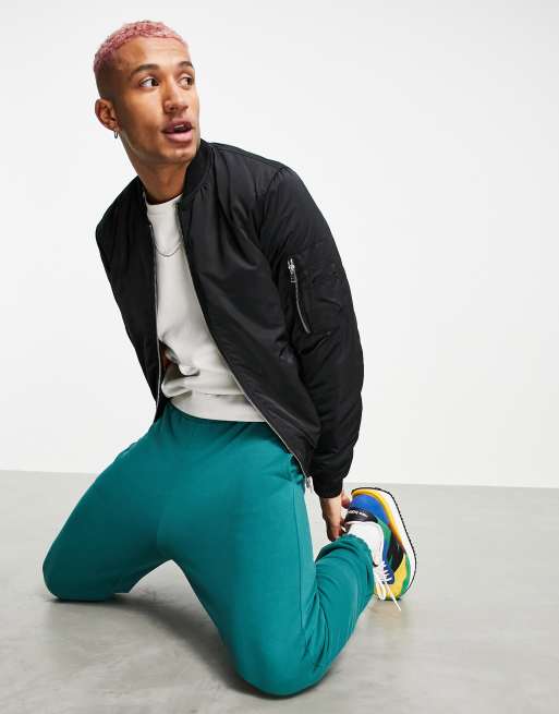 Chaqueta bomber negra acolchada con forro naranja de tejido ligero de ASOS DESIGN