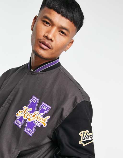 Chaqueta bomber negra extragrande con diseño universitario y parches violetas de ASOS DESIGN, 4 de 4