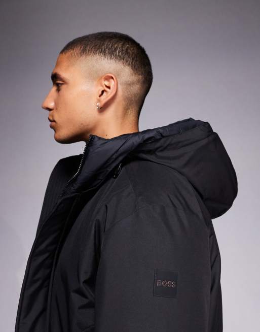 Chaqueta bomber negra gruesa con capucha Osis de Boss Orange, 4 de 5