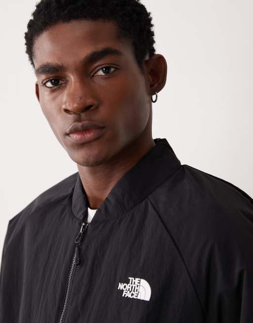 Chaqueta bomber negra ligera aislante NSE de The North Face, 3 de 5