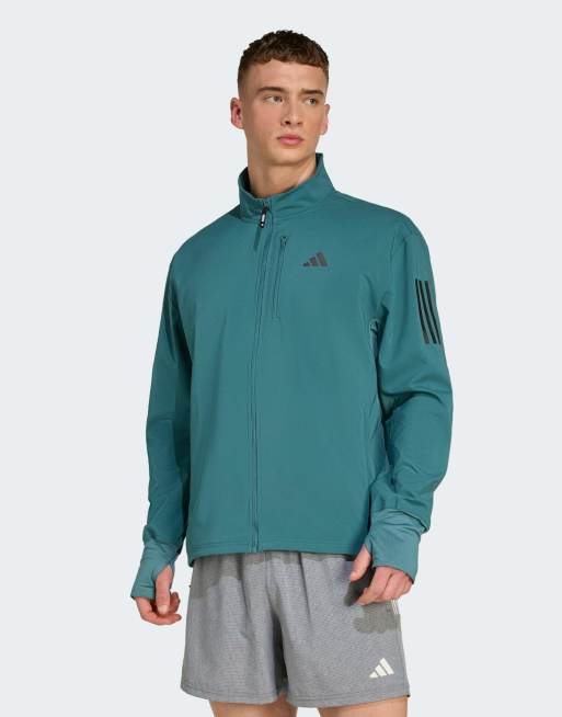 Chaqueta color cerceta Own the Run Winterized de adidas performance