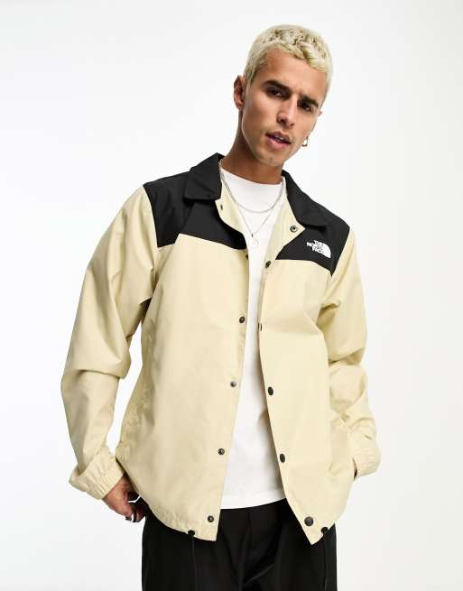 Chaqueta color piedra y negra estilo entrenador exclusiva en ASOS de The North Face