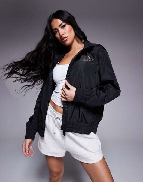 Chaqueta corta negra con capucha y logo dorado de Armani EA7 - view 1
