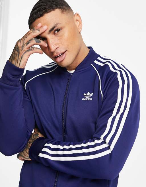 loto simpatía Interminable Chaqueta de chándal azul marino con tres rayas adicolor de adidas Originals  | ASOS