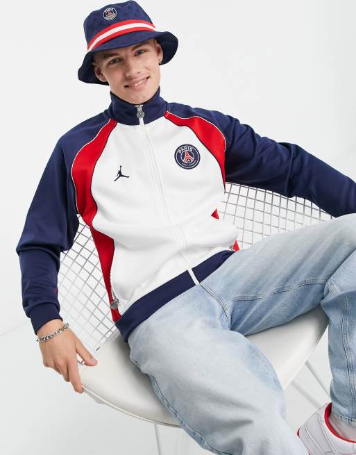 Chaqueta de ch ndal azul marino y blancos del Paris Saint Germain de Nike Jordan