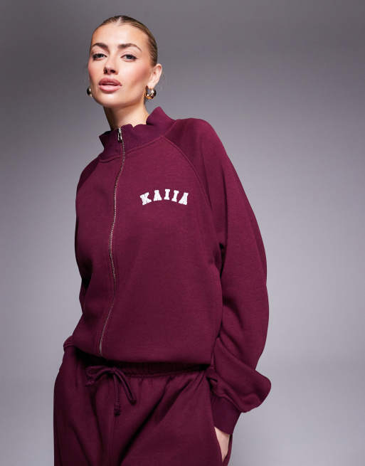 Chaqueta de chándal bomber burdeos extragrande con cremallera y logo en contraste de Kaiia (parte de un conjunto)