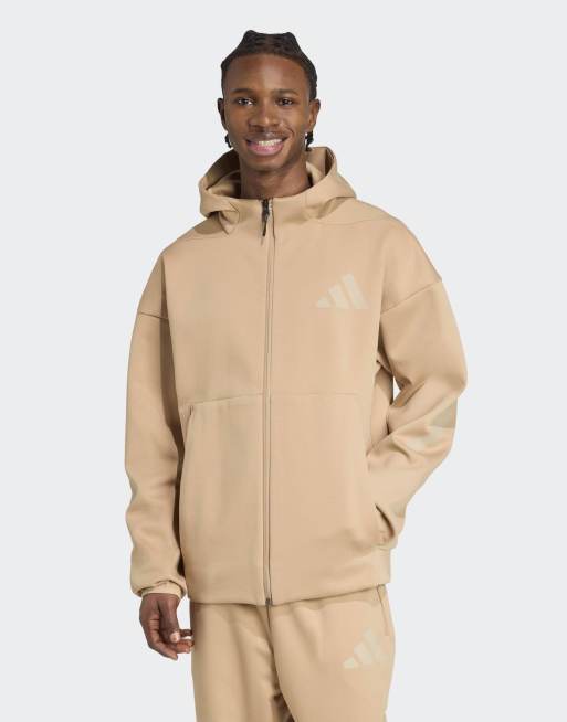 Chaqueta de chándal color arena cálido y marrón arcilla con capucha y cremallera Z.N.E. de adidas Performance