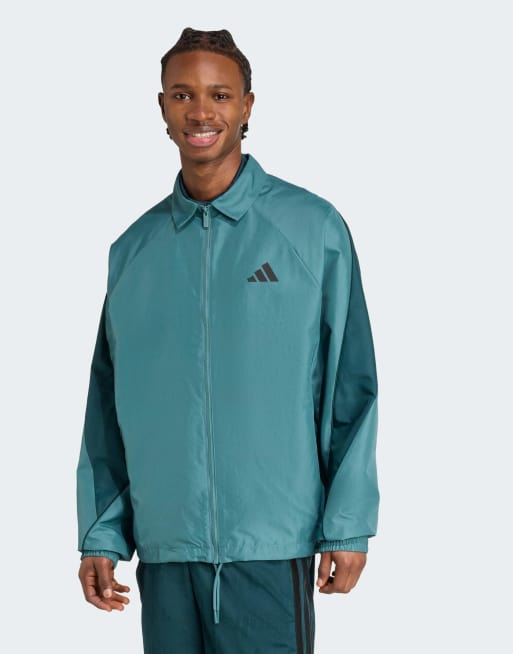 Chaqueta de chándal color cerceta envejecido y verde hiedra Stadium de adidas Performance