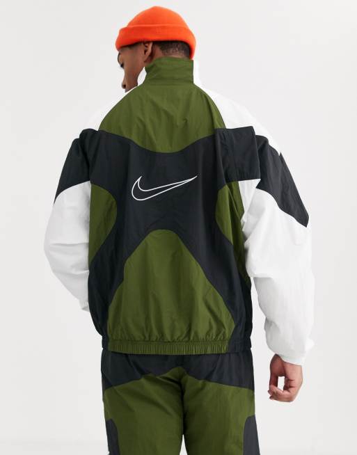 Chaqueta de chándal cremallera color Re-Issues de Nike | ASOS