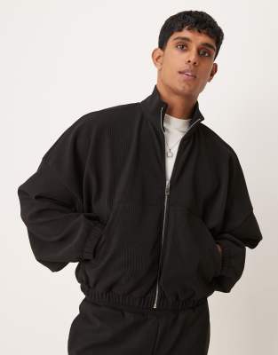 Chaqueta de chándal corta negra ultragrande de canalé de ASOS DESIGN ...