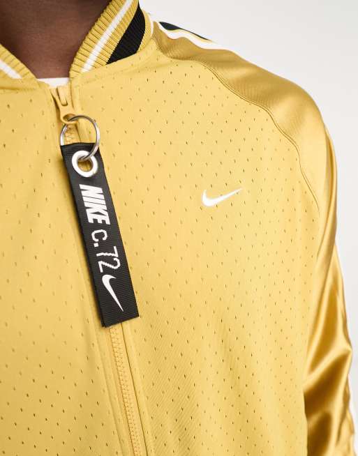 Chaqueta de ch ndal dorada Circa de Nike Basketball ASOS