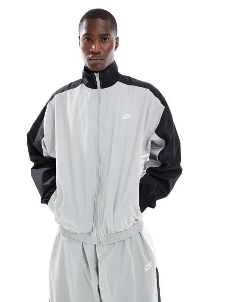 Chaqueta de chándal gris extragrande de tejido liso de Nike Club - view 1