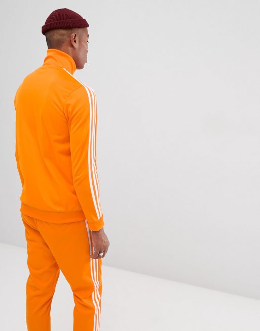 Hay una tendencia proteína Muestra Chaqueta de chándal naranja DH5821 Beckenbauer de adidas Originals | ASOS