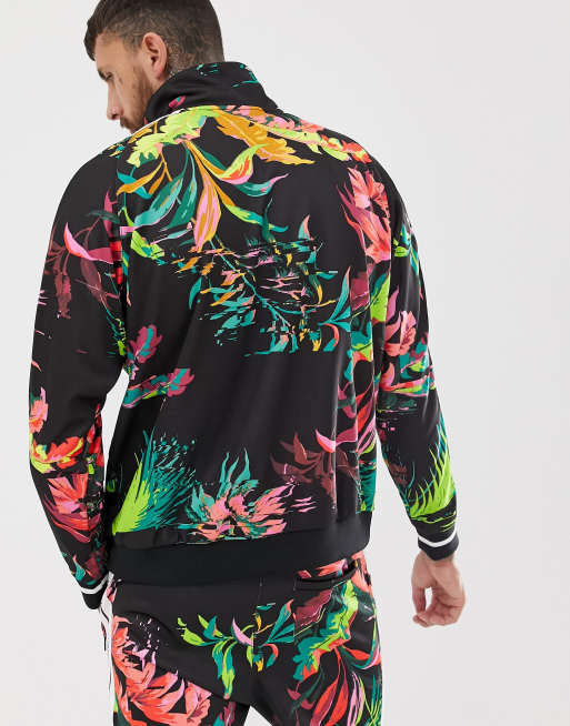 Chaqueta de ch ndal negra con estampado floral de Nike